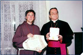 Pope John Paul II honours Delegation Chaplain, Father Michael Seed with the Papal decoration Cross in recognition of his interfaith work for the Holy See