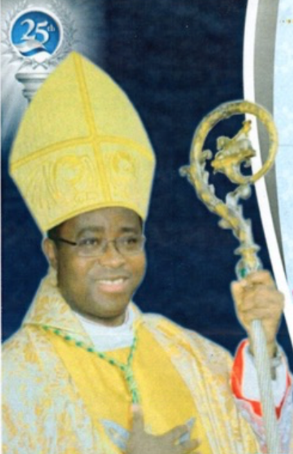Delegate congratulates Rev Dr Brian Udaigwe on the 25th anniversary of his priestly ordination